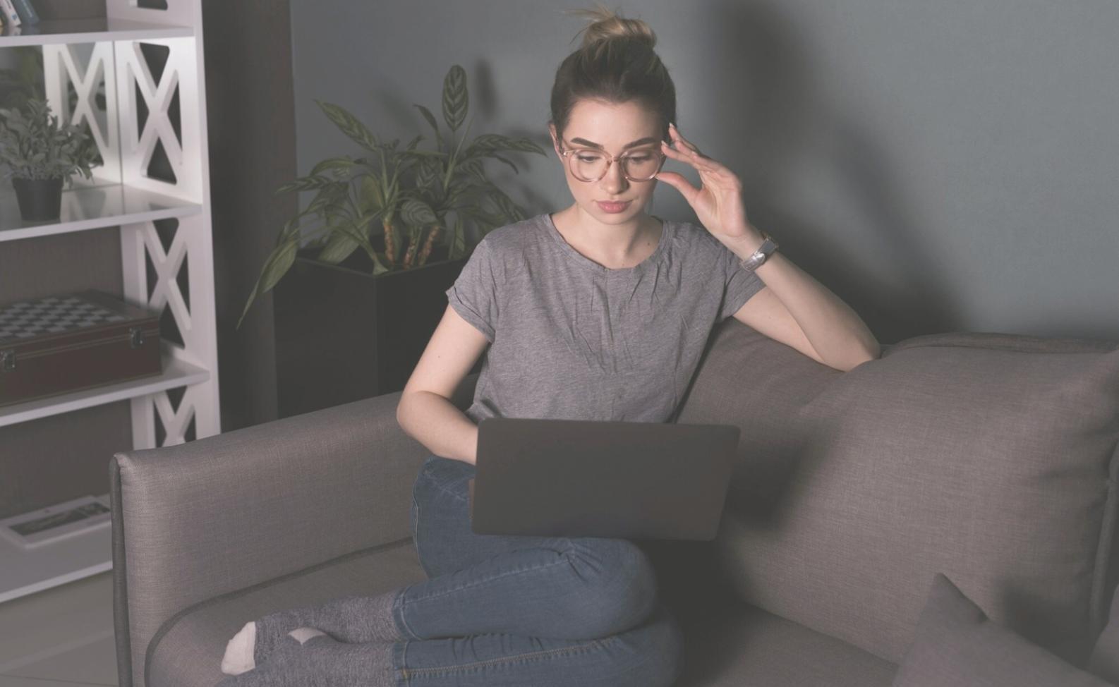 Business professional reviewing financial documents and budget analysis reports
